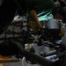 USS Nimitz sailors perform helicopter maintenance