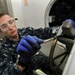 USS Nimitz sailors at work