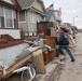 Community Relations workers canvas neighborhood in Long Beach, New York.