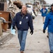 Community Relations workers canvas neighborhood in Long Beach, New York.