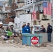 Community Relations workers canvas neighborhood in Long Beach, New York.