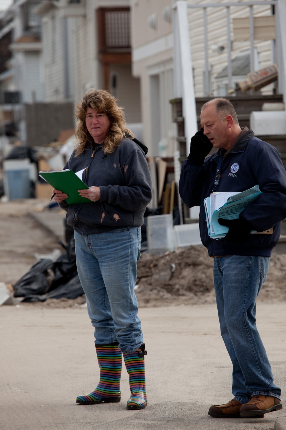 Community Relations workers canvas neighborhood in Long Beach, New York.