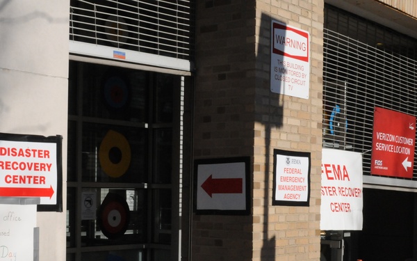Signs at FEMA disaster center entrance