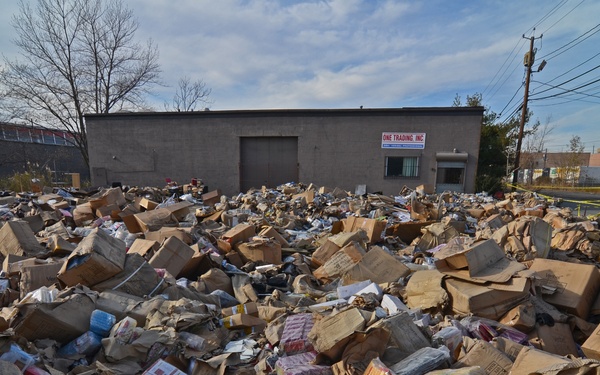 Mountains of trash pile up after Superstorm Sandy roars through New Jersey
