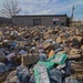 Mountains of trash pile up after Superstorm Sandy roars through New Jersey