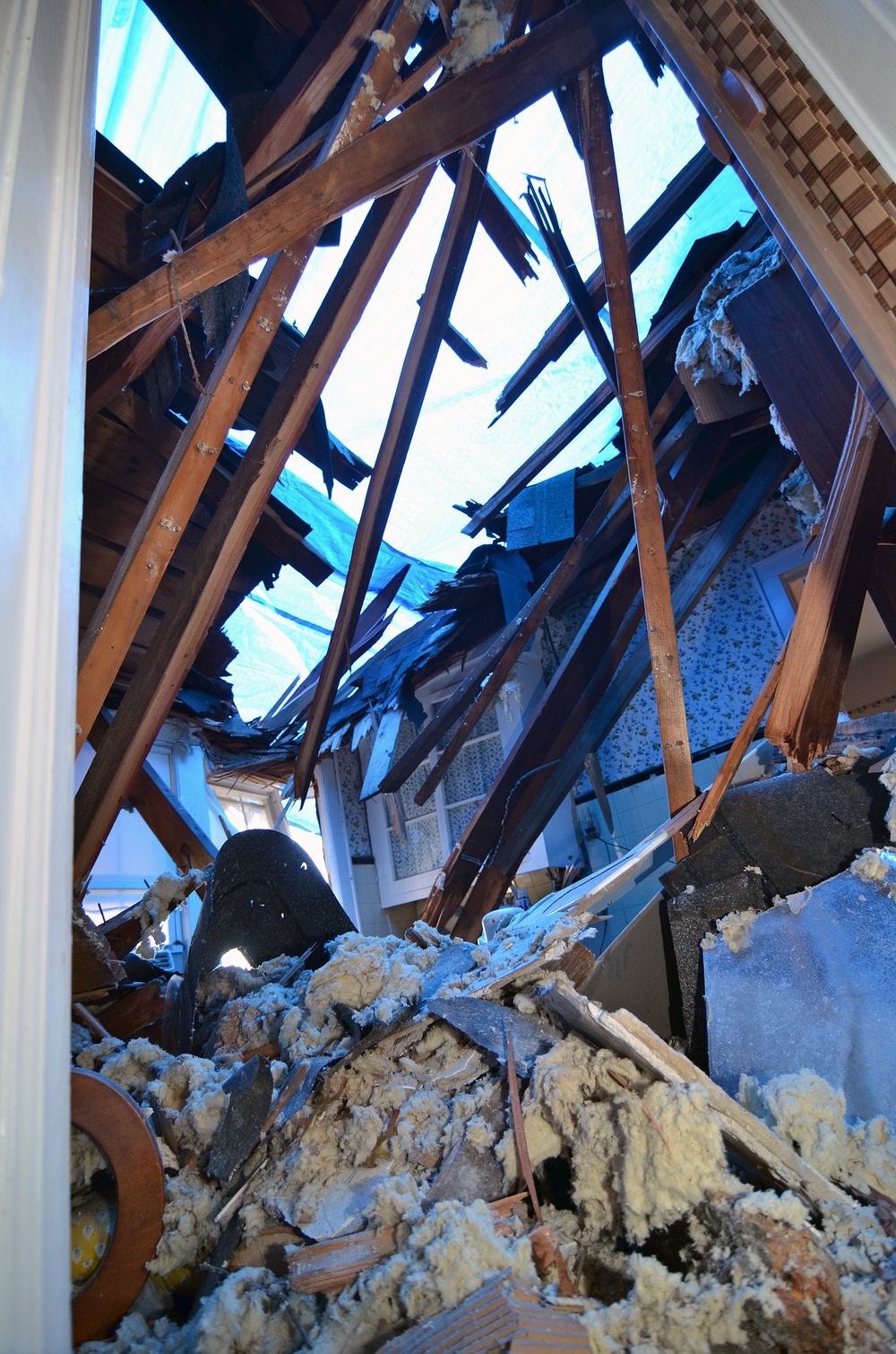 Uprooted trees during Superstorm Sandy cause major damage to homes