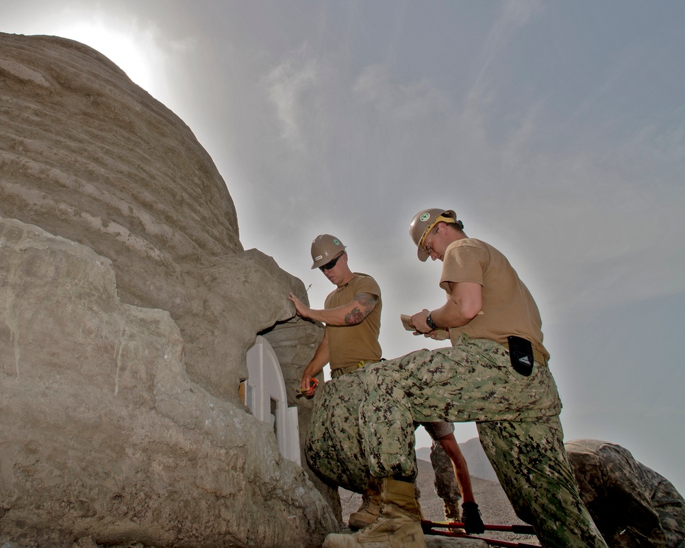 Building eco dome brings villagers, service members together