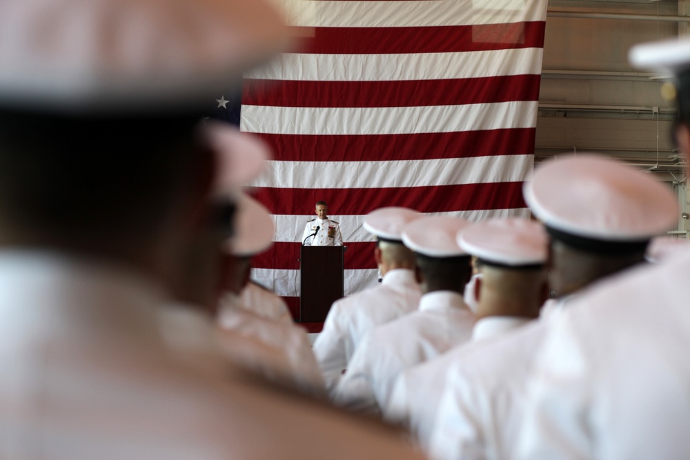 Cmdr. Brad L. Arthur relieves Cmdr. Brian K. Pummill as commanding officer of Helicopter Sea Combat Squadron 9 at change of command ceremony