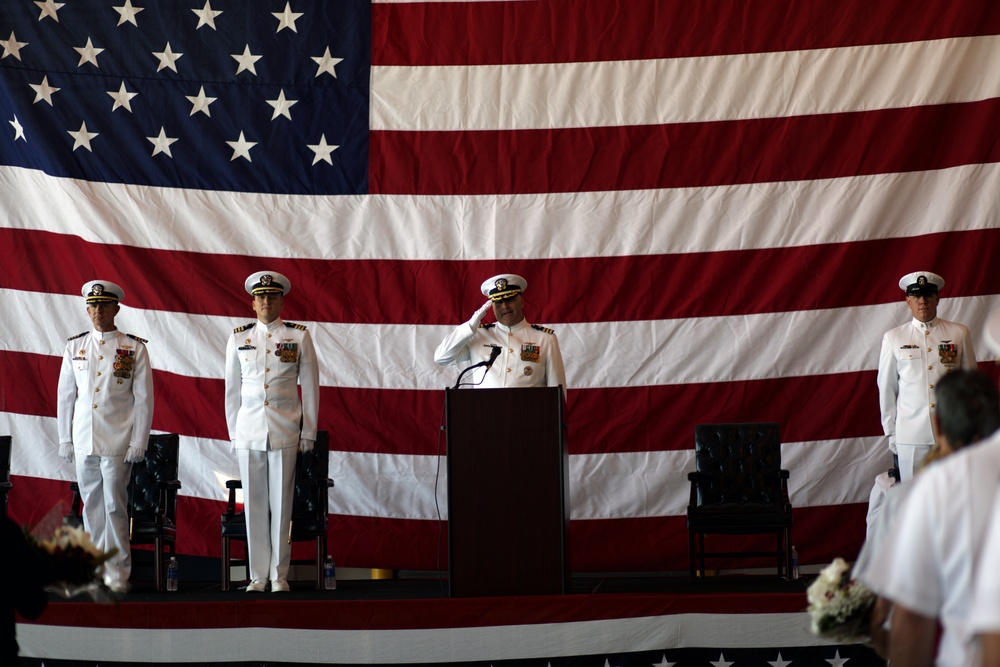 Cmdr. Brad L. Arthur relieves Cmdr. Brian K. Pummill as commanding officer of Helicopter Sea Combat Squadron 9 at change of command ceremony