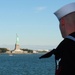 USS Michael Murph passes Statue of Liberty