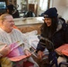 FEMA Community Relations specialist assists hurricane survivor in Coney Island, New York