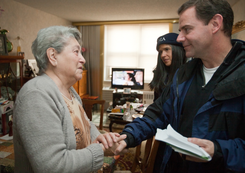 FEMA Community Relations specialist assists hurricane survivor in Coney Island, New York