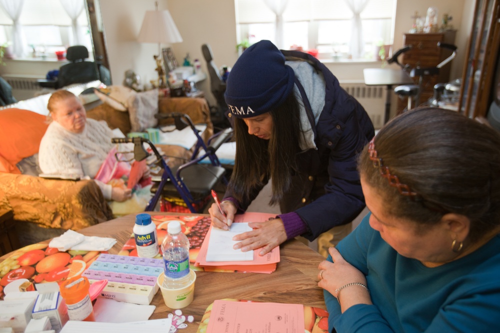 FEMA Community Relations specialist assists hurricane survivors in Coney Island, NY