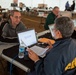 FEMA Disaster Recovery specialist assists Hurricane Sandy survivor with FEMA registration