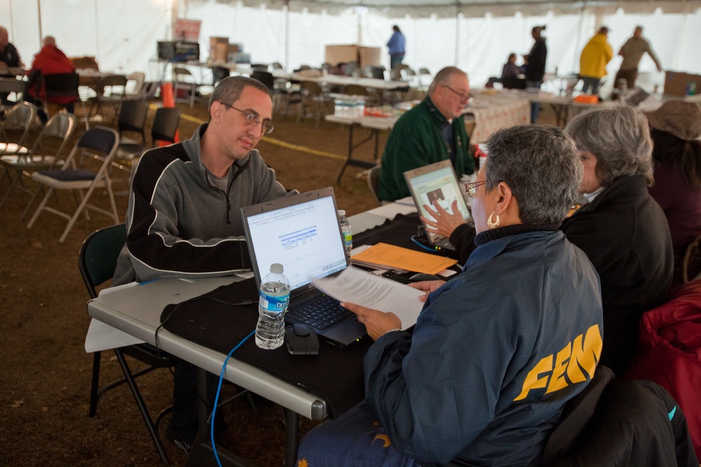 FEMA Disaster Recovery specialist assists Hurricane Sandy survivor