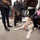 Comfort Dog provides support to a disaster survivor at a FEMA Recovery Center in Long Beach, NY