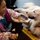 Comfort Dog provides support to a disaster survivor at a FEMA Recovery Center in Long Beach, NY