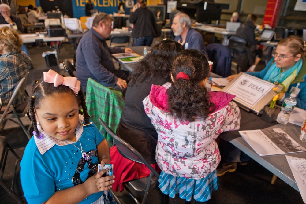 FEMA personnel assist disaster survivors in a Recovery Center in Long Beach, NY