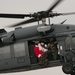 Santa trades sleigh for helicopter, ditches elves for Airmen