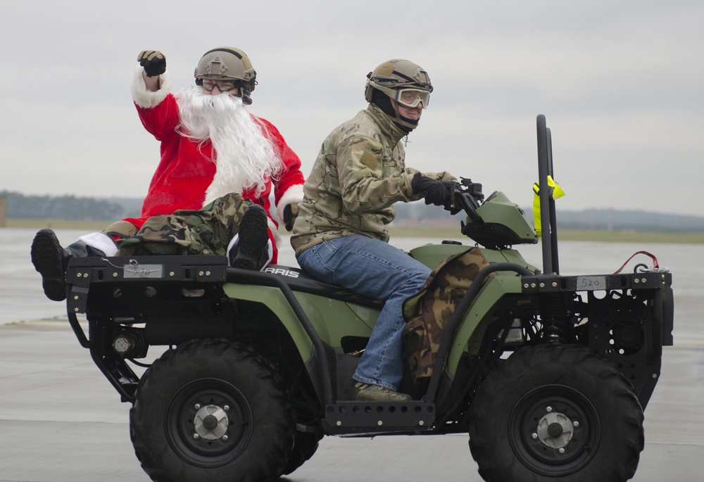 Santa trades sleigh for helicopter, ditches elves for Airmen