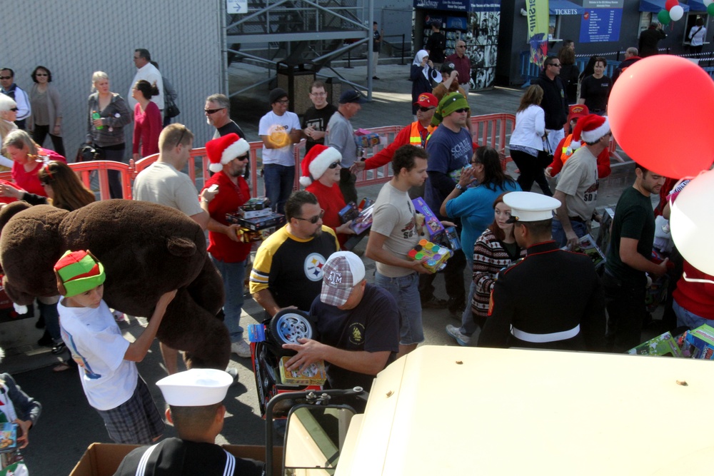 Marines collect Toys for Tots at USS Midway