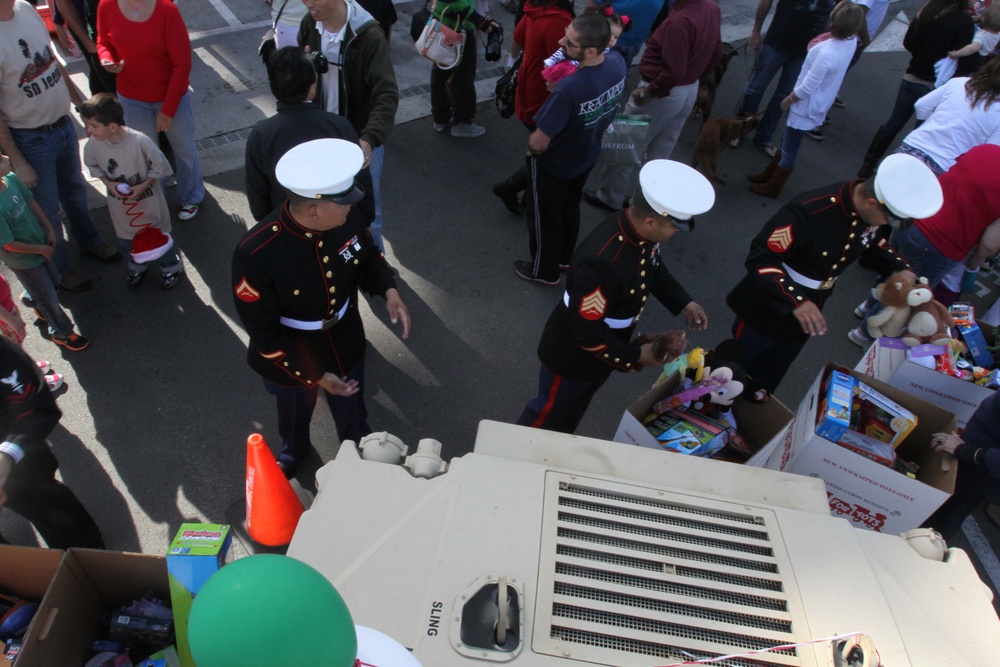 Marines collect Toys for Tots at USS Midway