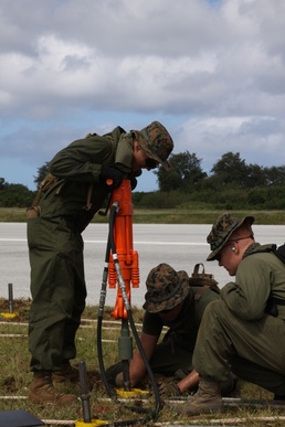 Marines prepare to receive arrested landings on Tinian
