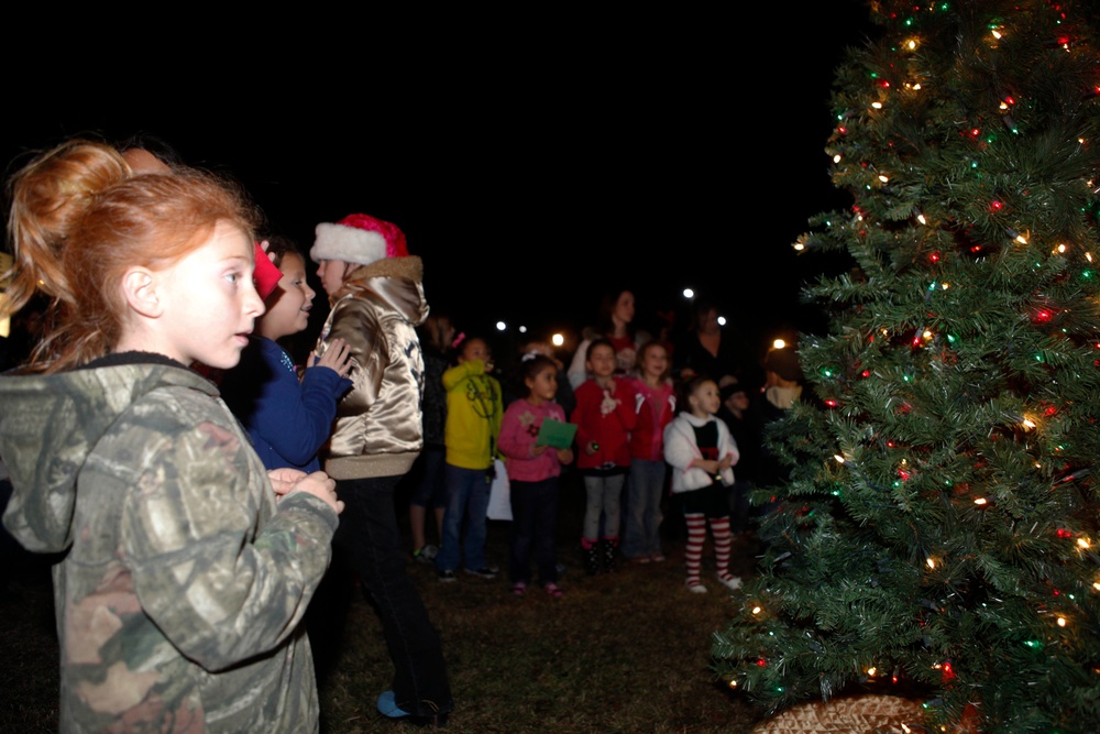 Tarawa Terrace illuminates during holiday tree lighting ceremony