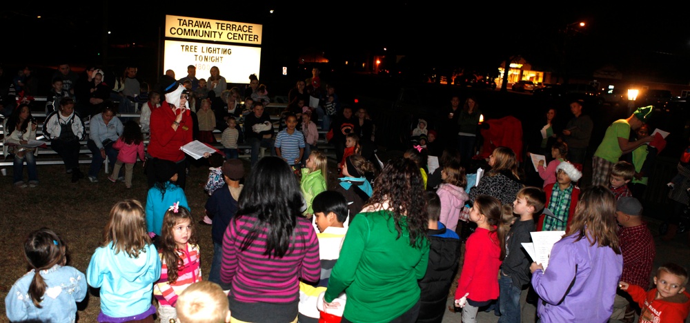 Tarawa Terrace illuminates during holiday tree lighting ceremony