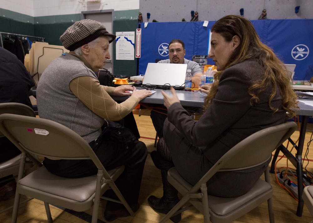 Non-English speaking FEMA applicants assisted by FEMA interpreters
