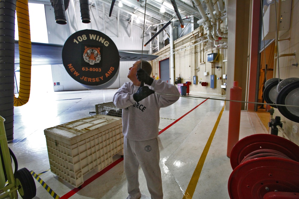 108th Wing fuel systems airmen help Stratotanker return fuel