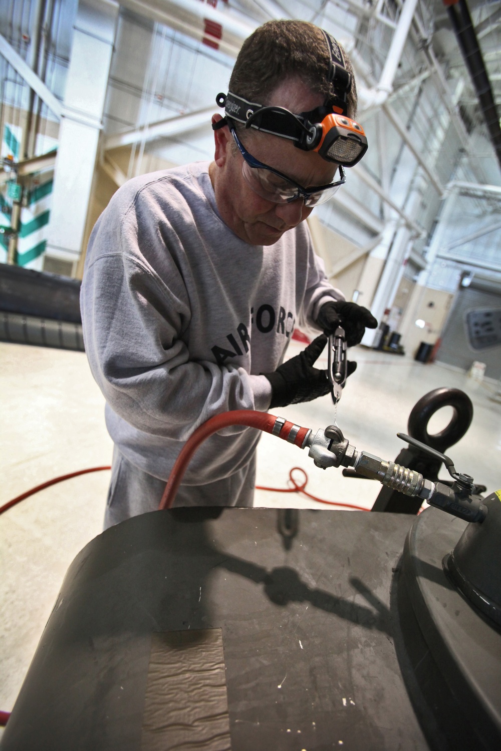 108th Wing fuel systems airmen help Stratotanker return fuel