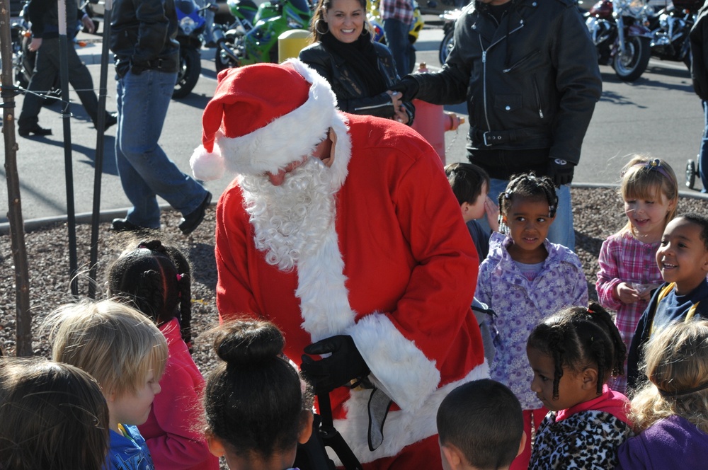 Iron Brigade riders bring holiday cheer to children