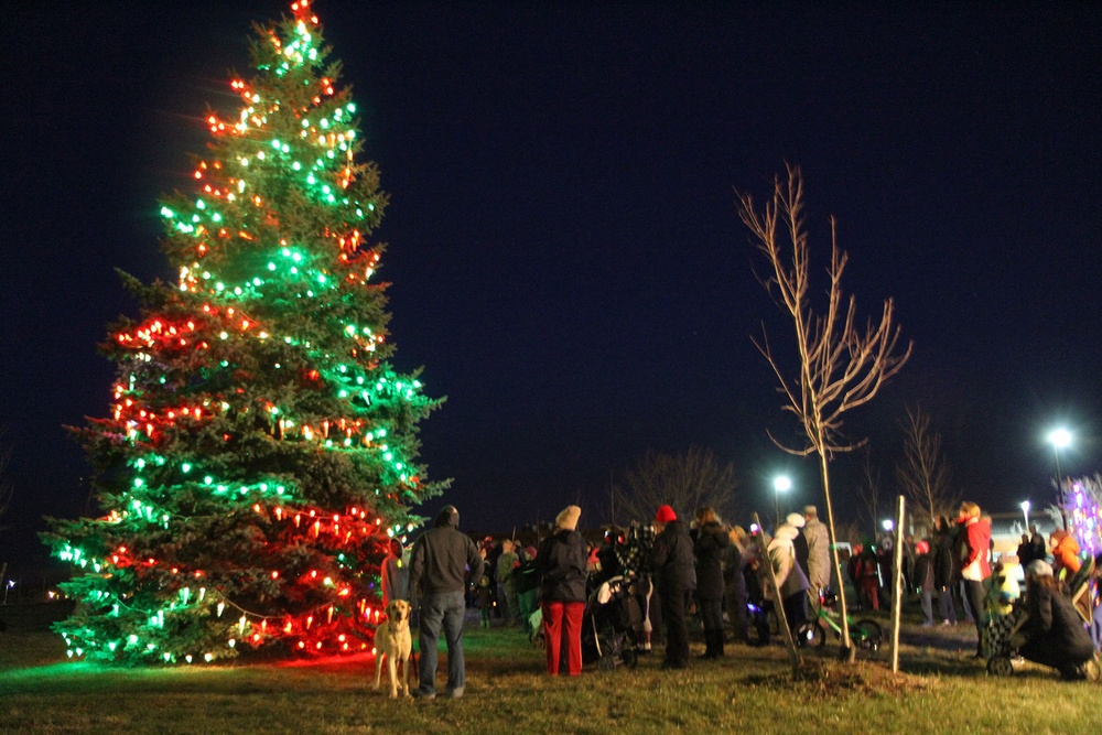Fort Drum residents gather around and admire the Main Post Chapel holiday