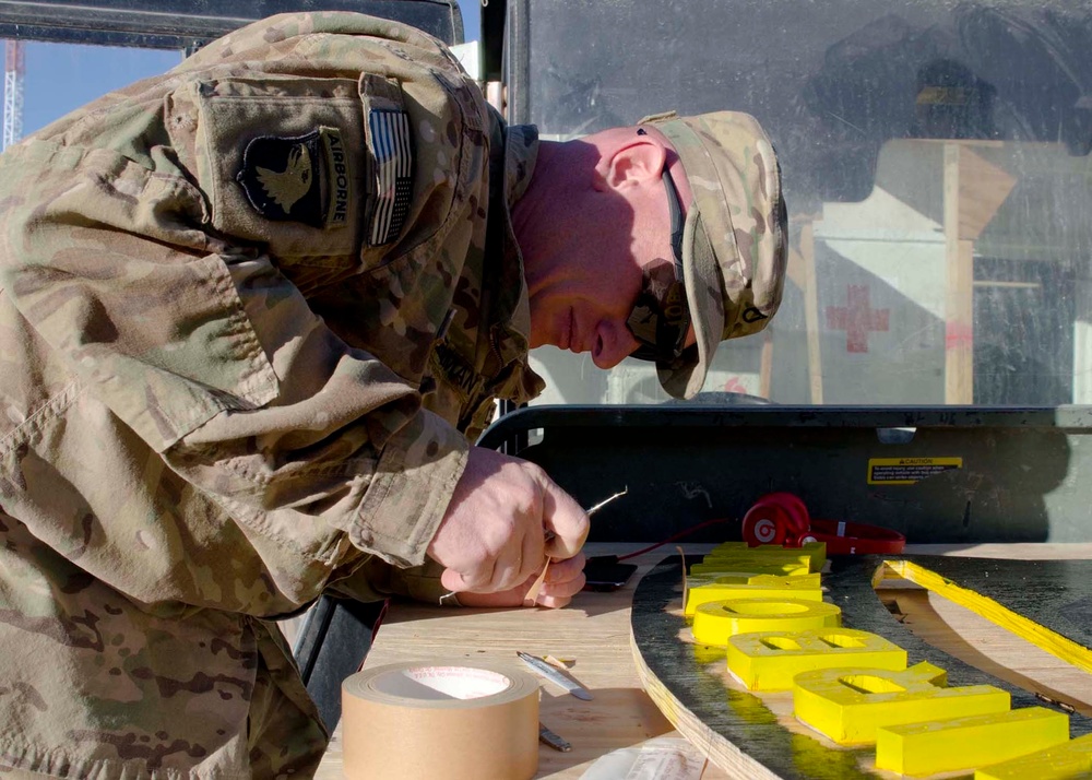 101ST Airborne Division soldiers paint logo