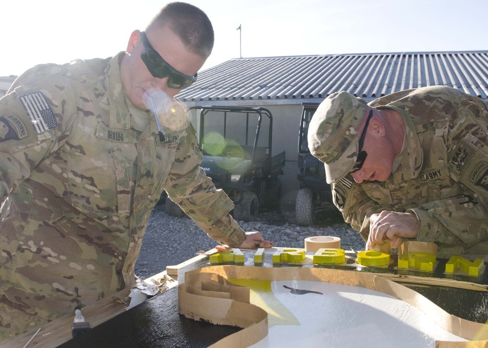 101ST Airborne Division soldiers paint logo