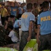 Philippine service members, U.S. Marines off-load supplies in Davao