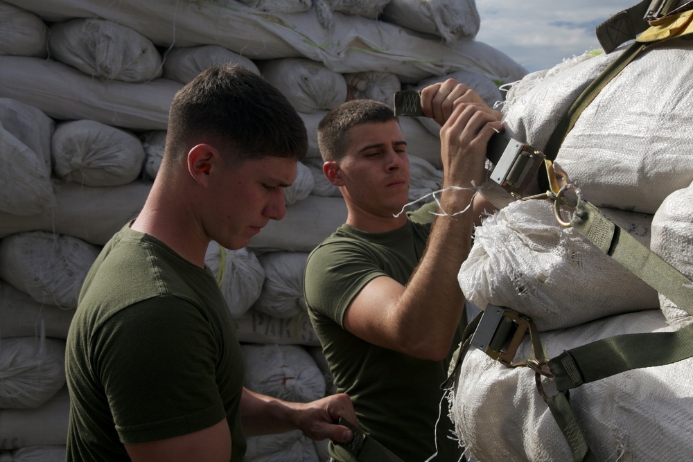 Landing support, embarkation Marines streamline relief efforts