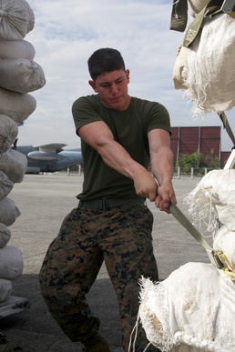 Landing support, embarkation Marines streamline relief efforts