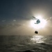 MH-60S Knight Hawk carries supplies to USS Mobile Bay