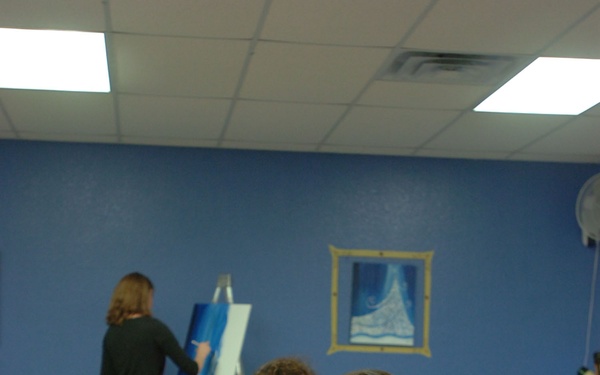 Spouses add Cav flare to Painting with a Twist party