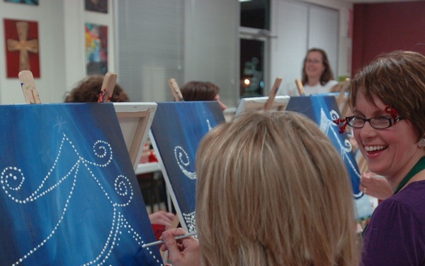 Spouses add Cav flare to Painting with a Twist party