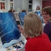 Spouses add Cav flare to Painting with a Twist party