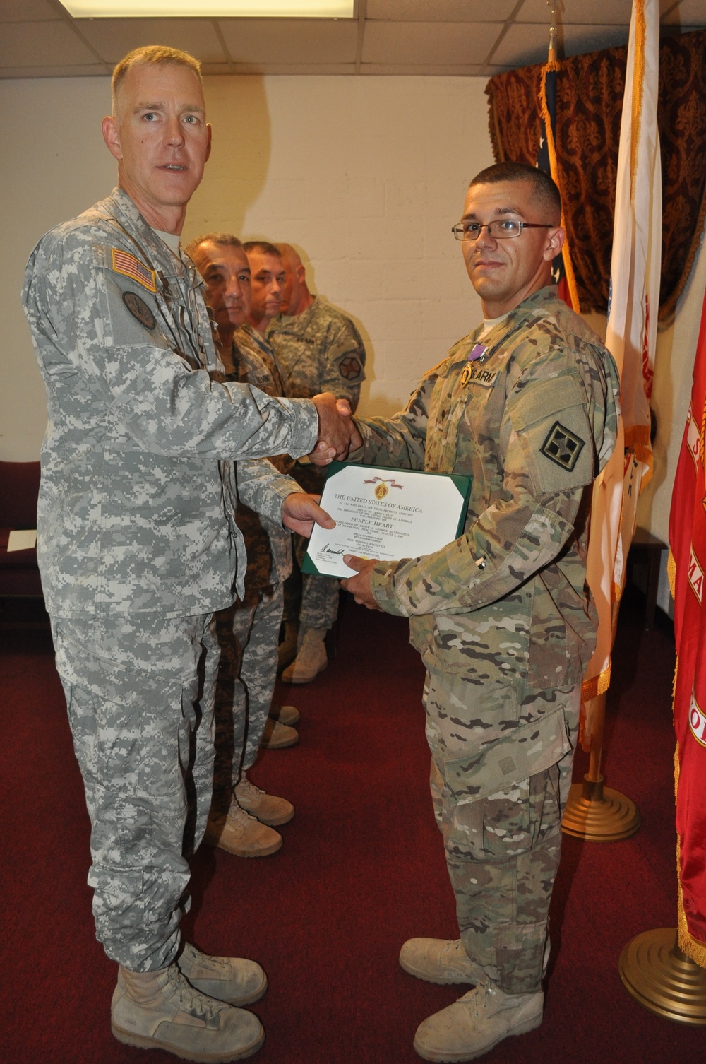 DoMaD presents Purple Heart to Reserve engineer