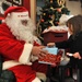 Santa Claus greets airmen, families at post office