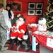 Santa Claus greets Airmen, families at post office