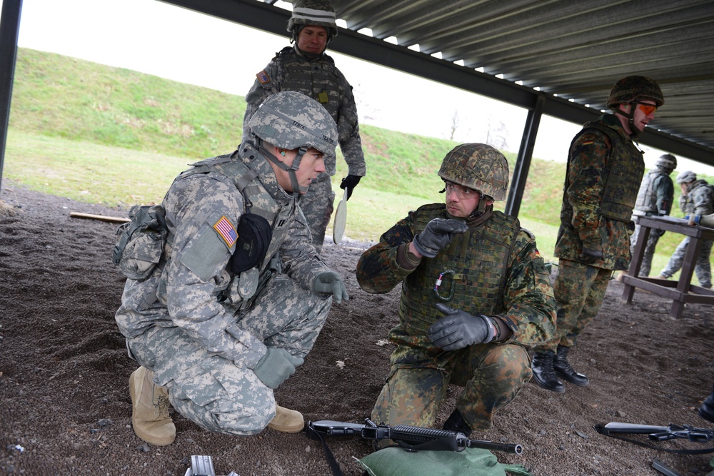 US and German soldiers discuss target practice