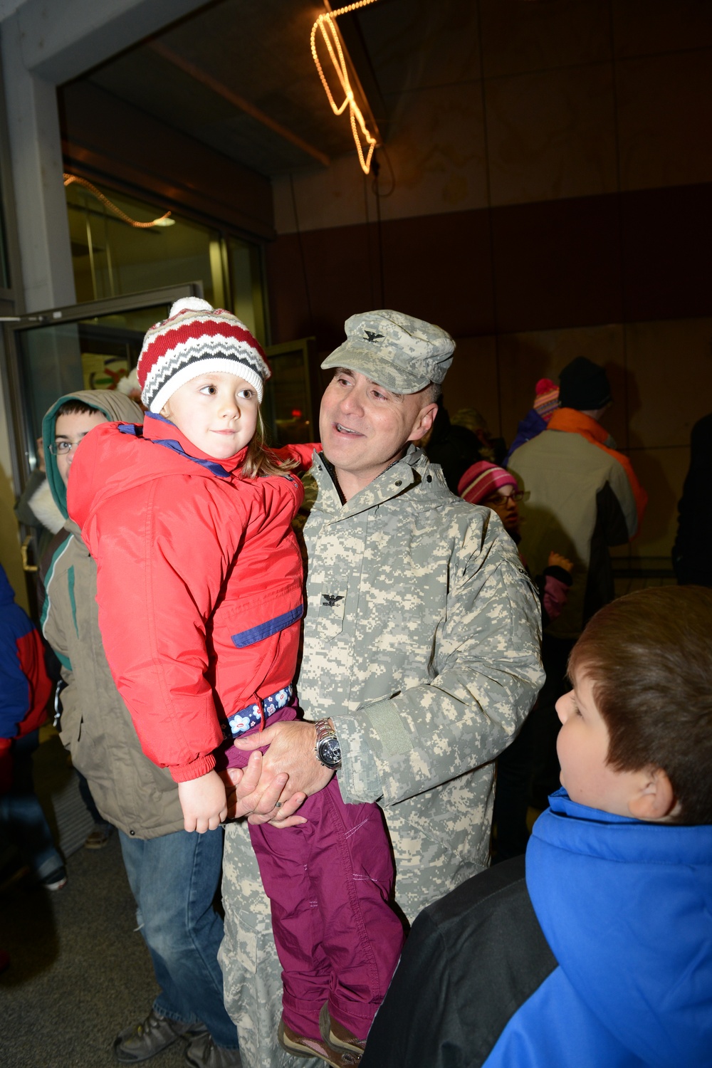 Father and daughter go to see Santa Claus