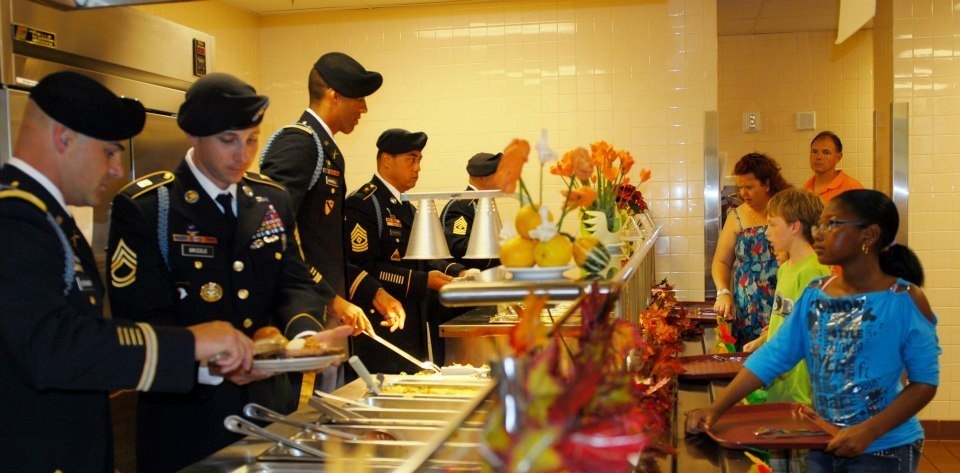 Giving thanks: Bronco Brigade officers, senior NCOs serve up a Thanksgiving feast