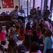 Soldiers read to young children